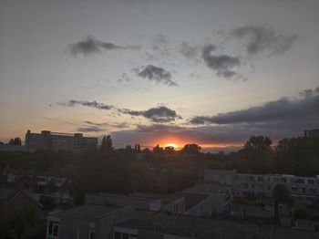 High angle view of townscape against sky during sunset