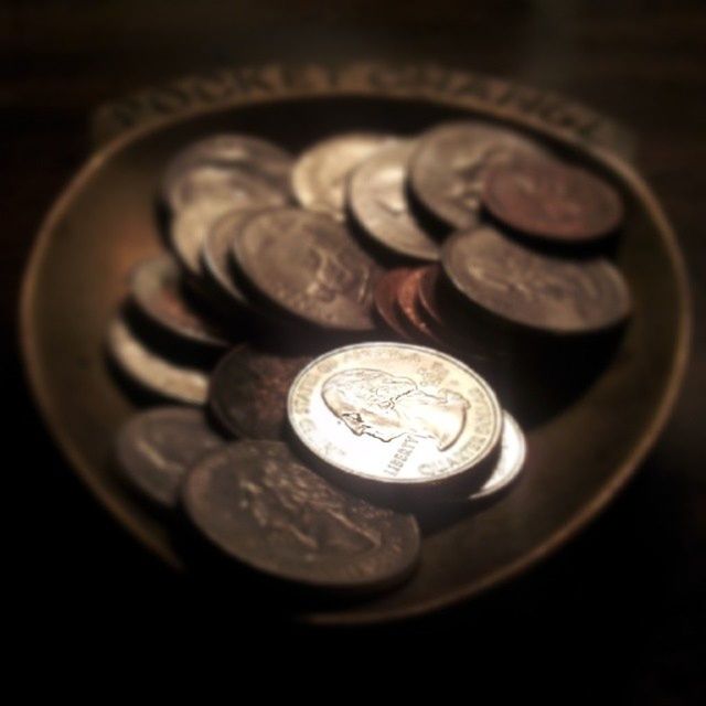 close-up, indoors, metal, still life, metallic, single object, coin, selective focus, circle, no people, focus on foreground, old, high angle view, table, number, pattern, antique, spiral, detail, equipment