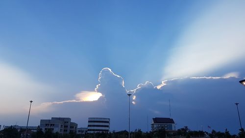 Low angle view of street light against sky