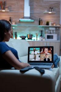 Man using laptop at home