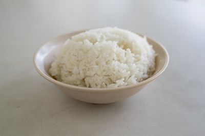 Close-up of rice in bowl on table