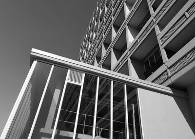 Low angle view of modern building against clear sky