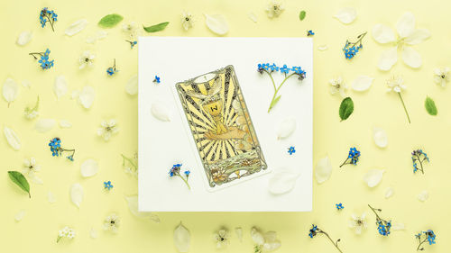 High angle view of christmas decorations on yellow background