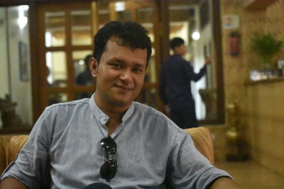 Portrait of young man standing outdoors