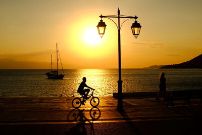 Silhouette of boat at sunset