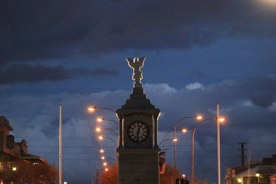 Silhouette of church against sky at night