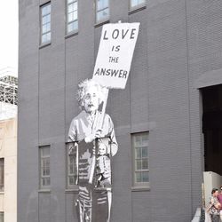 High angle view of man with text on building