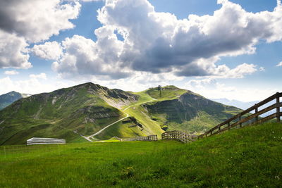 Scenic view of landscape and mountains against sky