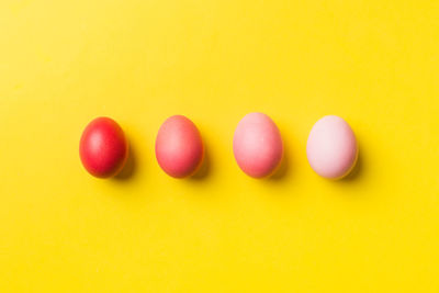 Close-up of pills against yellow background