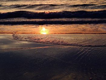 Scenic view of sea at sunset