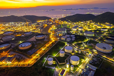 High angle view of illuminated cityscape at night