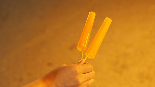 Cropped hand of person holding ice cream