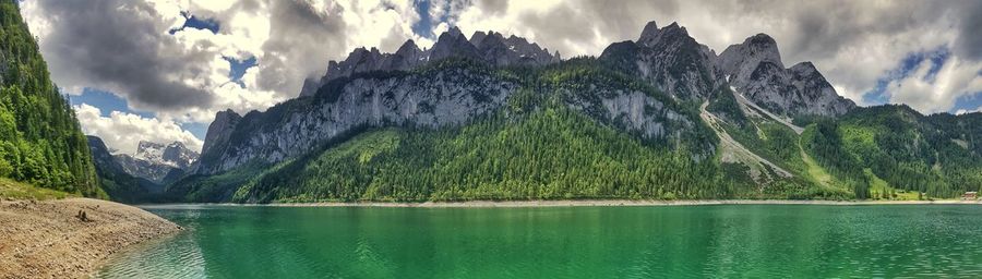 Panoramic view of lake and mountains against sky