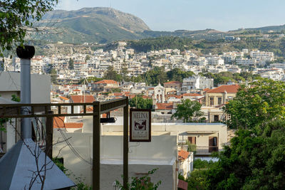 Buildings in city against sky