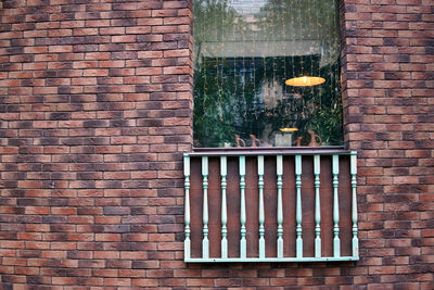 View of window on brick wall