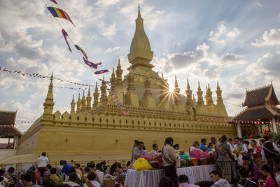 Group of people in temple against building