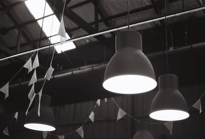 Low angle view of pendant light hanging from ceiling