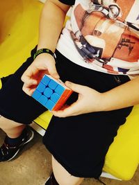 High angle view of woman hand