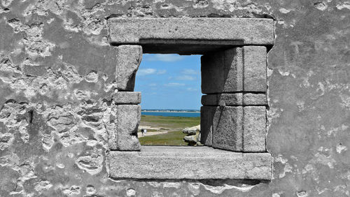 Close-up of old ruins against sky