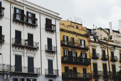 Low angle view of residential buildings against sky