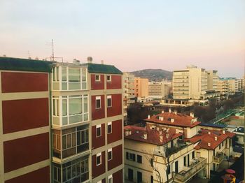 High angle view of buildings in city against sky