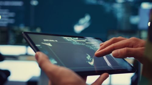 Midsection of woman using mobile phone