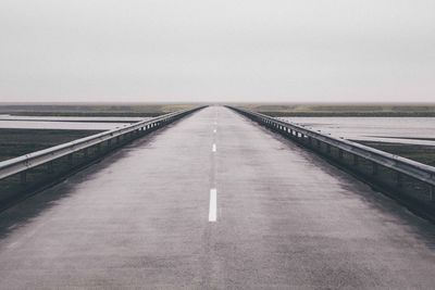 Road against clear sky