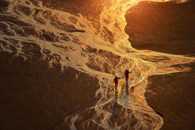 High angle view of man walking on beach