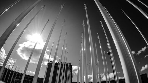 Low angle view of metallic pole against sky on sunny day