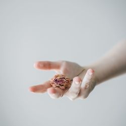 Close-up of hand over white background