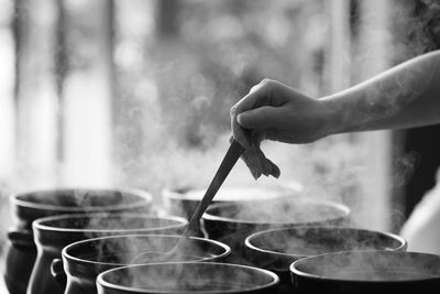 Close-up of person preparing food