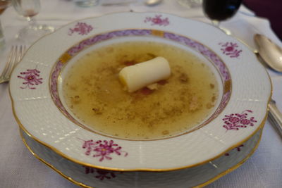Close-up of soup served on table