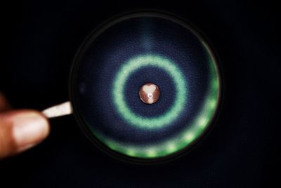 Close-up of illuminated light bulb