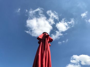 Low angle view of statue against blue sky