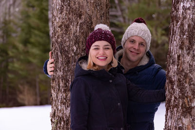 Portrait of a smiling young woman in winter