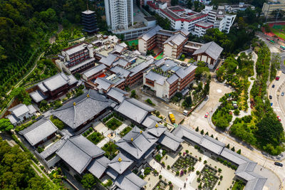 High angle view of houses and buildings in city