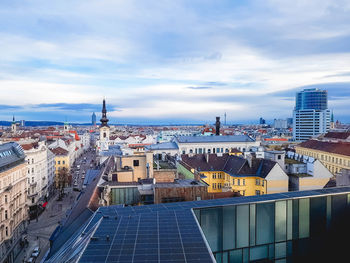 Panoramic view of vienna, cityscape of roofs of houses, skyline, domes of cathedrals and churches 