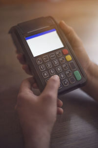 Close-up of man using mobile phone