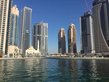 Marine resort buildings against clear sky