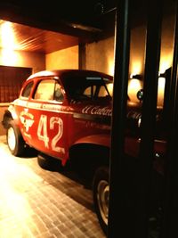 Vintage car on street at night