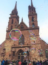 Low angle view of clock tower against clear sky