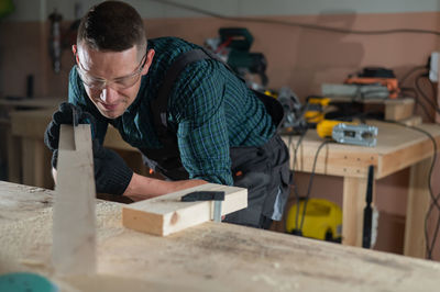 Man working on wood