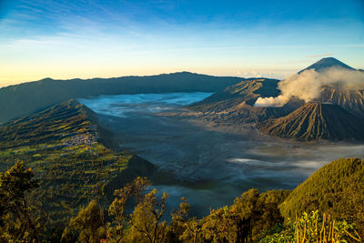 Scenic view of volcanic mountains against sky