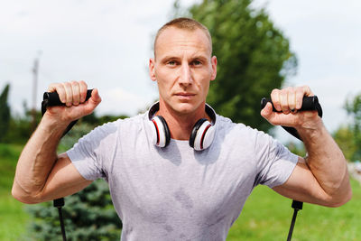 Portrait of man standing outdoors