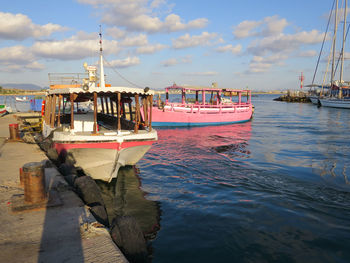 Boats moored at harbor against sky in city - travel 046, akko  akkon  acre, israel
