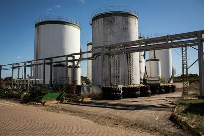 Low angle view of water tower against sky