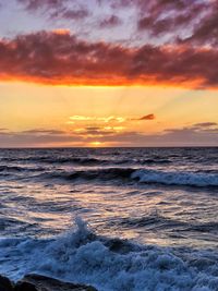 Scenic view of sea against sky during sunset