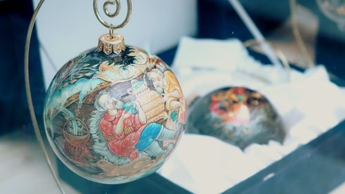 Close-up of decoration on glass table