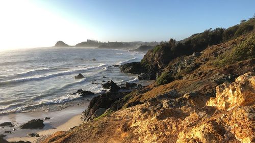 Scenic view of beach against clear sky