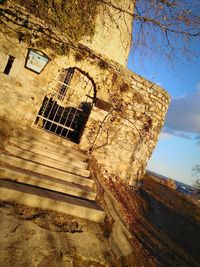 Low angle view of old building against sky